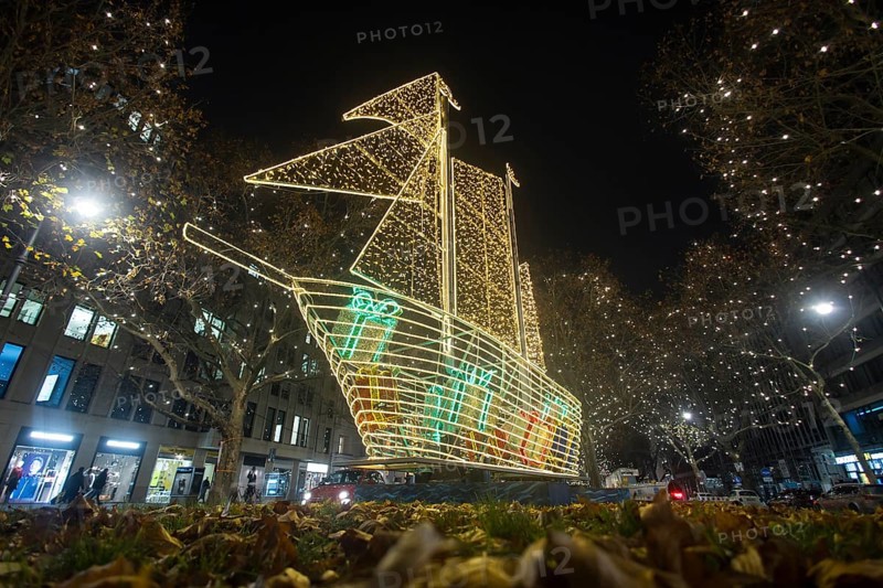 The KurfÃ¼rstendamm in western Berlin with Christmas lights and several light installations, such as this ship, on 25.11.2025. The magnificent boulevard is illuminated with 150, 000 lights between Breitscheidplatz and Halensee