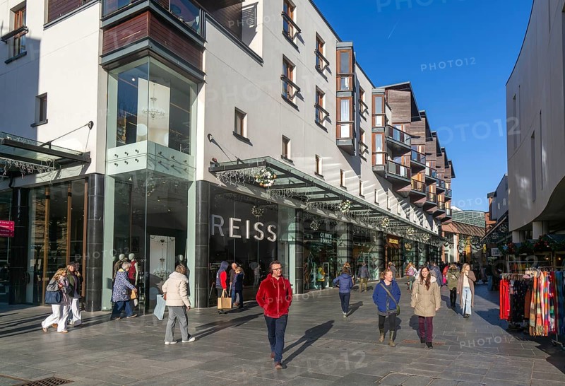 Shoppers walking past Reiss shop store in city centre, Princesshay, Exeter, Devon, England, UK