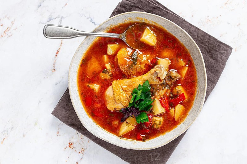 Souzi soup. Georgian dish, meat with oats, tomato sauce and herbs