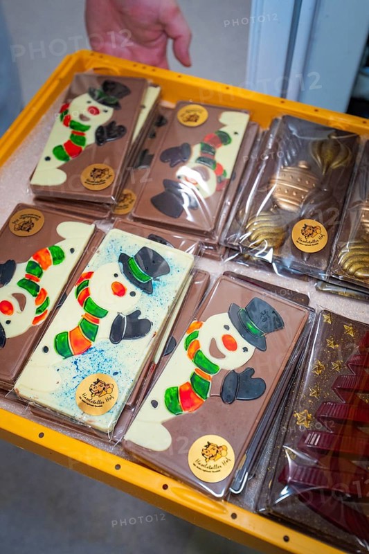 Various chocolate bars with painted snowmen in decorative packaging, Christmas baking, Haselstaller Hof, Wildberg, Calw district, Germany