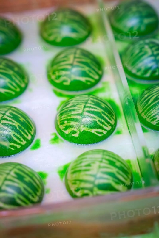 Green shaped chocolate balls with decorative pattern in a mold, Christmas baking, Haselstaller Hof, Wildberg, Calw district, Germany