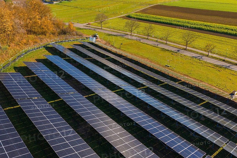 Field with solar panels shows use of technology nestled in autumn landscape, construction PV open-air plant, Weil der Stadt, Germany