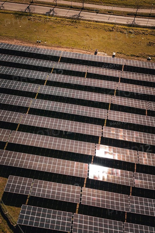 Brilliant solar modules photographed in orderly rows in the sun, PV Freifaechenanlage Bau, Weil der Stadt, Germany