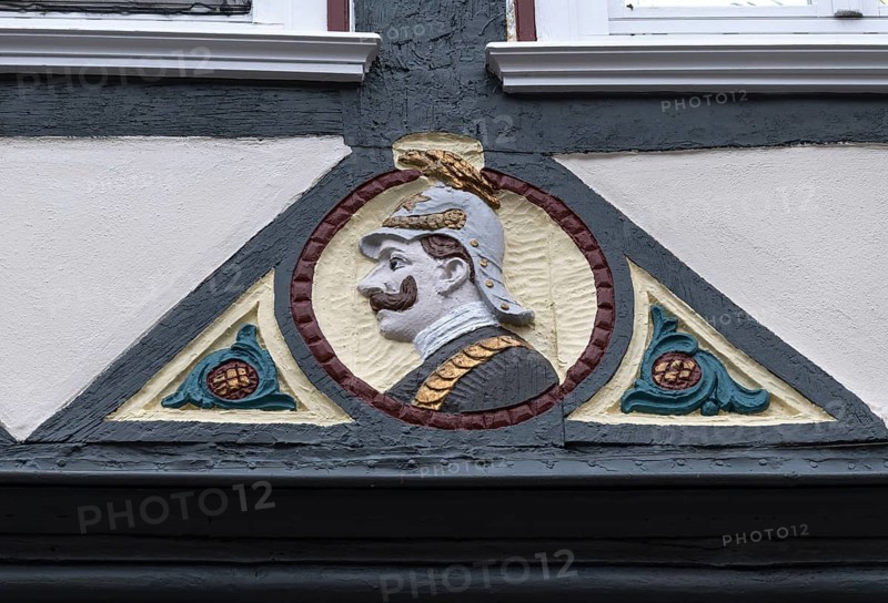 Decoration on half-timbered house, BarfÃ¼sserstraÃŸe, Marburg, Hesse, Germany