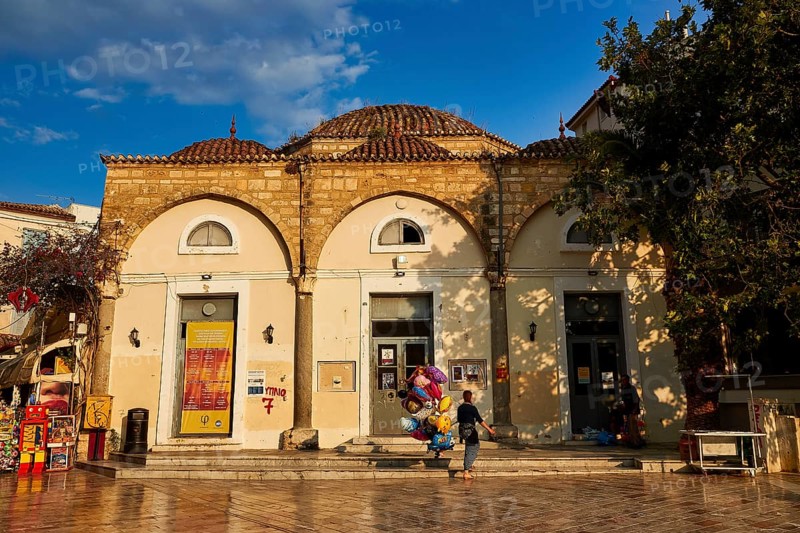 Old town of Nauplion, historic building with round dome and decorated doors, surrounded by trees, Nauplion, Nafplion, Peloponnese, Greece