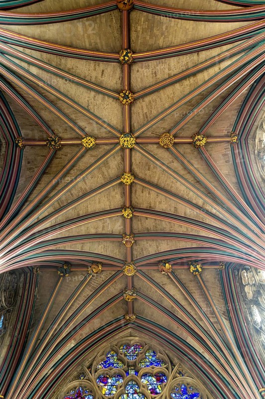 Looking up at vaulted ribbed ceiling inside Exeter cathedral church, Exeter, Devon, England, UK
