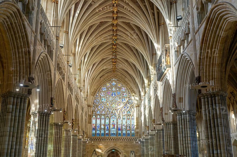 View to west window, vaulted ribbed ceiling inside Exeter cathedral church, Exeter, Devon, England, UK