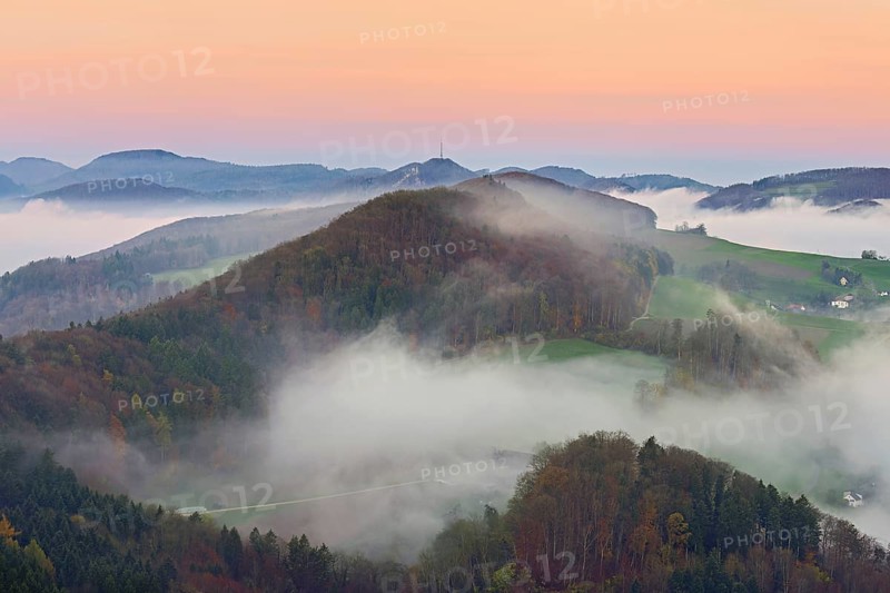 View from the Gisliflue of the Jura foothills covered in fog, Wasserfluh, Summerholde, in the light of dawn, Talheim, Canton, Aargau, Switzerland