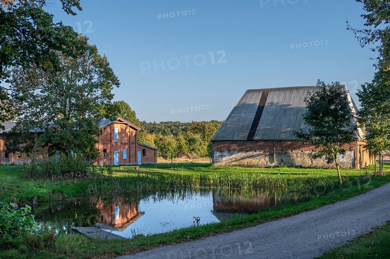 Historic buildings, pig and poultry house and pond of a manor from 1923, Othesdorf, Mecklenburg-Western Pomerania, Germany