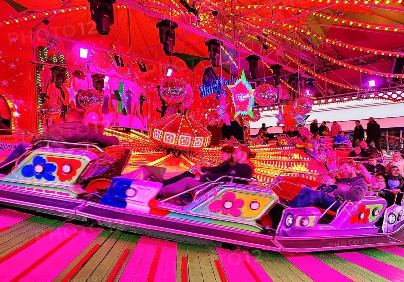 People on the Musik-Express ride at the All Saints Fair, the biggest old town fair in Europe, Soest, North Rhine-Westphalia, Germany