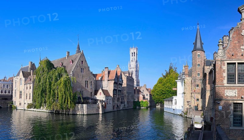 Famous view of Bruges old city with the Belfry and the Dijver canal, Bruges, Flanders, Belgium