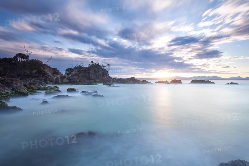 Sunset at Fisherman's Lookout. Dramatic waves and coastal scenery at The Pass, New South Wales, Australia