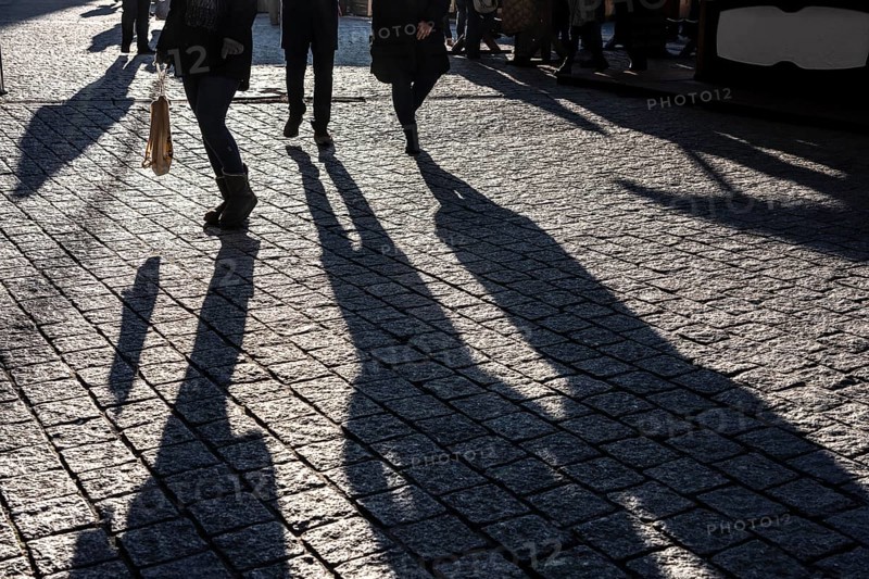 Shadows of people on the ground, low sun, winter, silhouettes, Germany