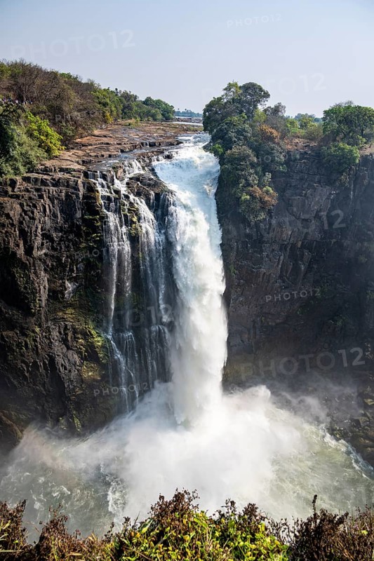 Water plunges into the depths, Victoria Falls with gorge, Zambezi, Zimbabwe