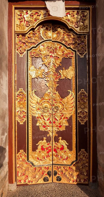 Temple door, Puri Saren Agung, the historic temple of the official residence of the royal family, Ubud, Bali, Indonesia