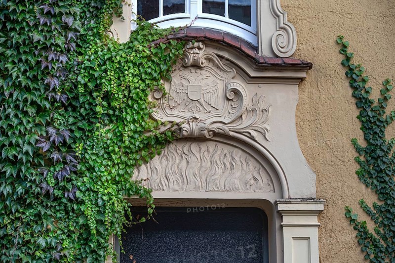 Stucco decoration above the entrance to Johanneum, built in 1905, near St. Johannis 1-3, Hanseatic City of LÃ¼beck, Schlesawig-Holstein, Germany