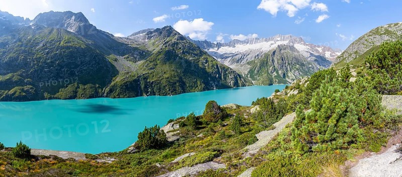 Turquoise blue mountain lake GÃ¶scheneralpsee, picturesque mountain landscape with dammastock and damma glacier, GÃ¶scheneralp, Canton of Uri, Switzerland