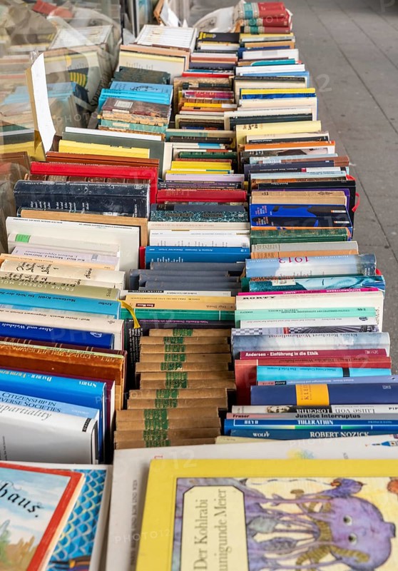 Table with partly old books, offered by a second-hand bookshop