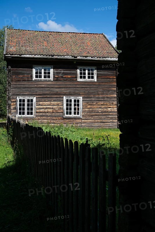 Wooden house on a historic farm, Maihaugen open-air museum with houses and objects from farms in Gudbrandsdal, Lillehammer on Lake MjÃ¸sa, Innlandet Municipality, Norway
