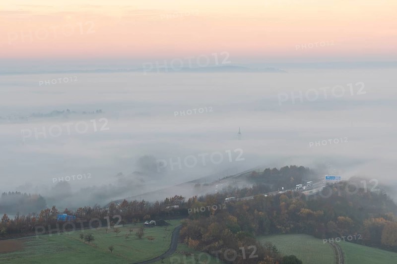 Aichelberg Alb climb of the A8 in thick fog on an autumn morning. Lkr. GÃ¶ppingen, Baden-WÃ¼rttemberg, Germany