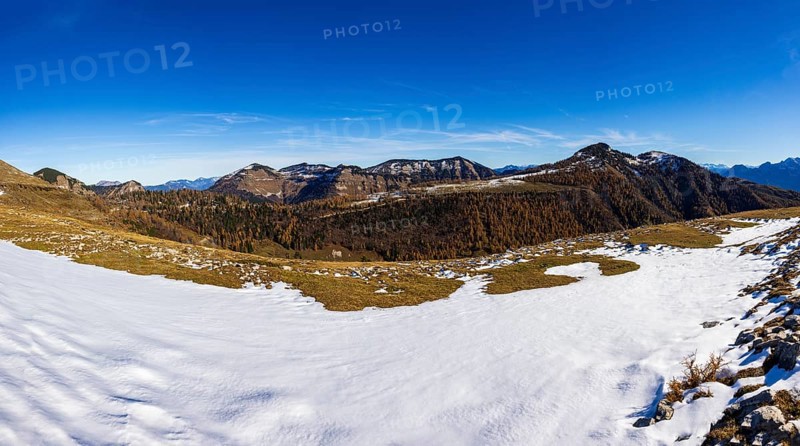Snowfield on the Trattberg Alm with a view of the Osterhorn Group, Salzkammergut, Salzburg, Austria