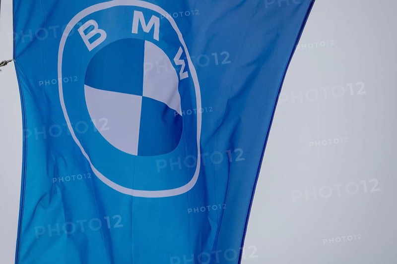 Flag with BMW logo on a car dealership