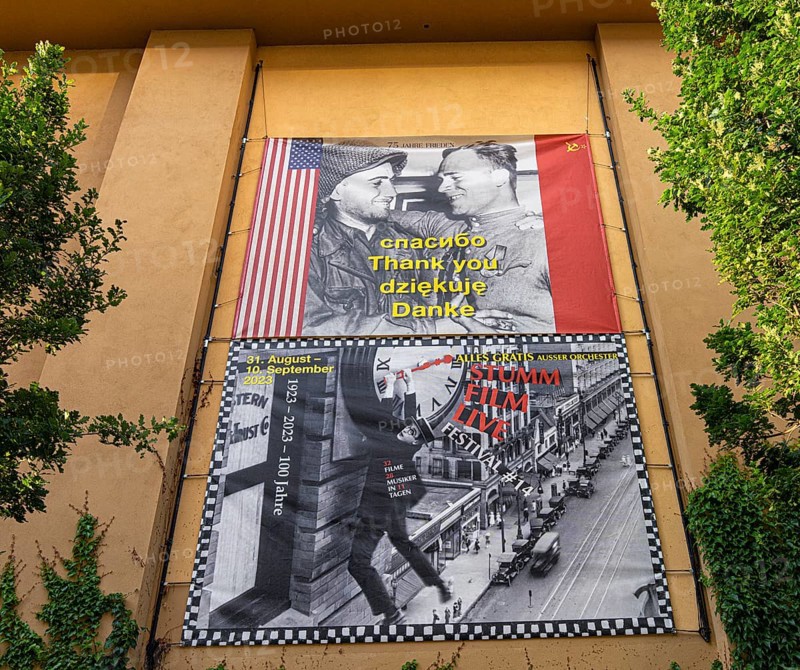 Film posters at the cult cinema Babylon on Rosa Luxemburg Platz, arthouse cinema opened in 1929, some of whose films are accompanied by a live orchestra, Berlin, Germany