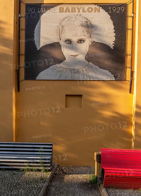 Film posters at the cult cinema Babylon on Rosa Luxemburg Platz, arthouse cinema opened in 1929, some of whose films are accompanied by a live orchestra, Berlin, Germany