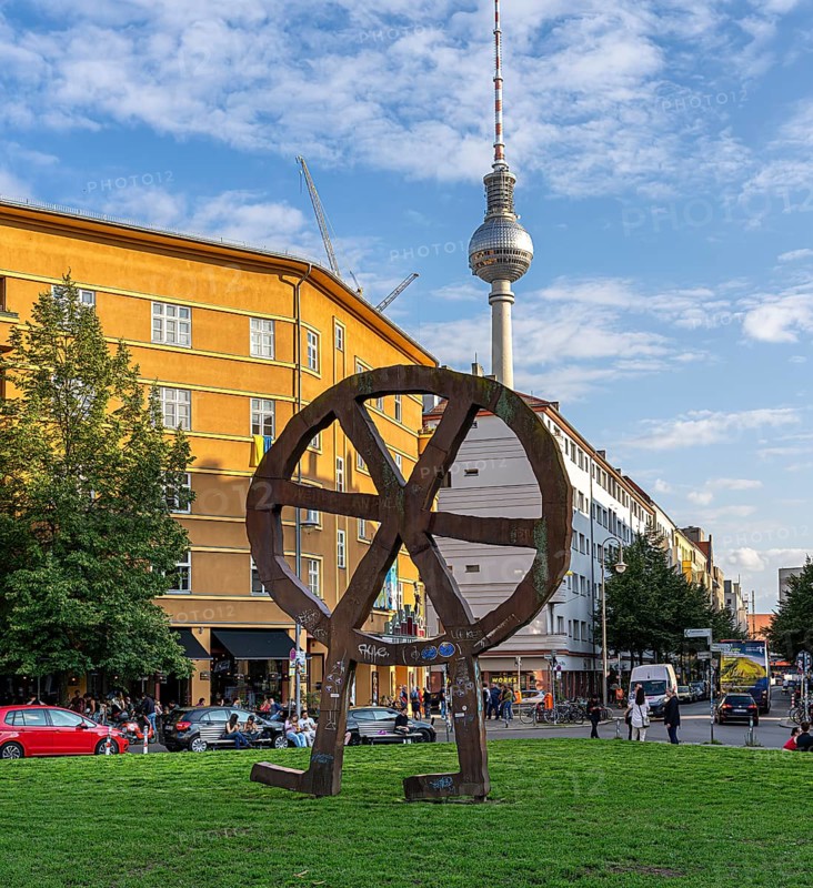 The Robber Wheel, metal sculpture and logo of VolksbÃ¼hen Berlin, made in 1994 by Swiss sculptor Rainer HauÃŸmann, Rosa Luxemburg Platz, Berlin, Germany