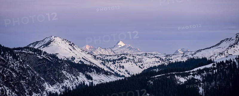 Summit of Grossglockner at sunset in winter, Hochbrixen, Brixen im Thale, Tyrol, Austria