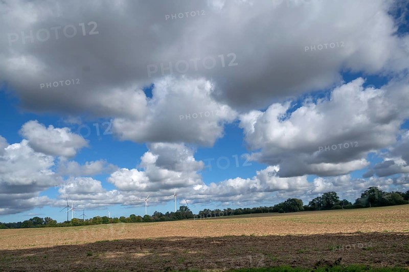 Landscape with wind turbines, cluster clouds (Cumulus), Mecklenburg-Western Pomerania, Germany