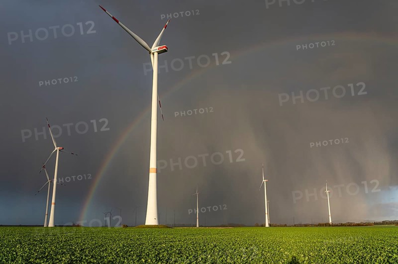 Königshovener Höhe onshore wind farm, on the A44 motorway near Bedburg, in front of the Jackerath triangle, autumn, rainbow, dark rain clouds, recultivated open-cast mining area, Garzweiler open-cast lignite mine, operated by RWE and the city of Bedburg, North Rhine-Westphalia, Germany