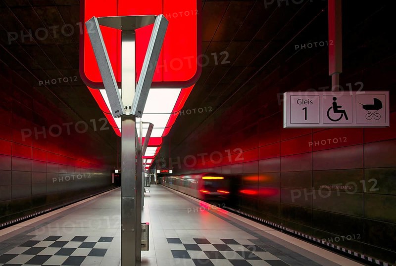 HafenCity University subway station, illuminated in color, red, underground train, movement effect, U4, empty, platform, stop, train station, subway, sign, boarding area wheelchair user, stroller, public transport, HVV, Hamburger Verkehrsverbund, Hochbahn, public transport, Free and Hanseatic City of Hamburg, Germany