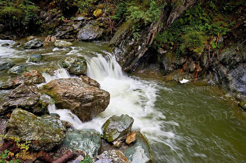 Small waterfall, Diosaz mountain river in the gorge, Gorges de la Diosaz, Les Houches, Chamonix-Mont-Blanc, Haute-Savoie, France