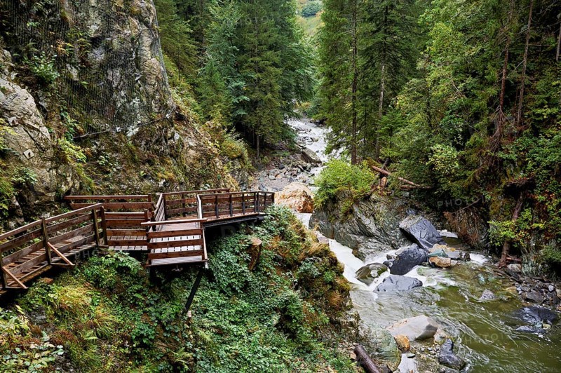 Wooden walkway on the Diosaz mountain river in the gorge, Gorges de la Diosaz, Les Houches, Chamonix-Mont-Blanc, Haute-Savoie, France