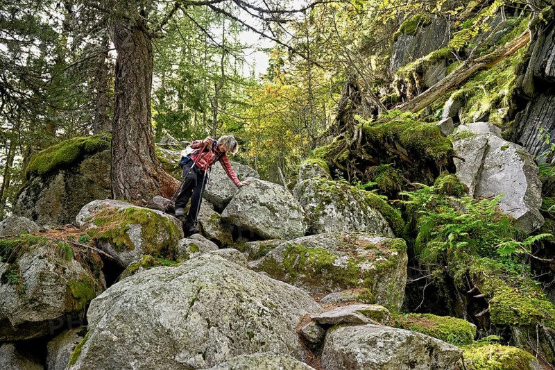 Female hiker on mountain tour in rocky terrain, Mont-Blanc, Chamonix-Mont-Blanc, Haute-Savoie, France