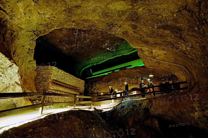Four people in a tunnel in a salt mine, salt mine, Bex, Canton of Vaud, Switzerland