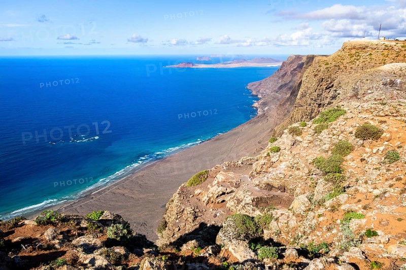 Castillejo viewpoint, view from the Risco de Famara cliff to the coast and the sea, Lanzarote, Canary Islands, Spain
