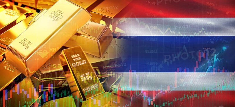 Gold bars stacked on Thai flag. Thailand gold reserves, Concept