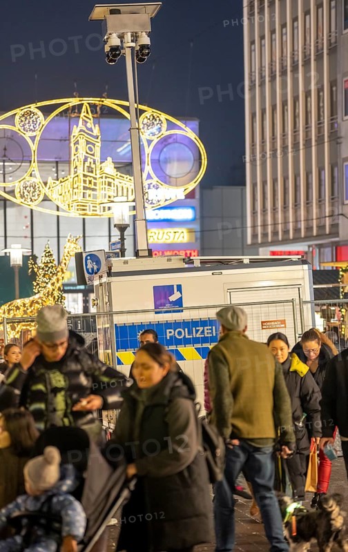 Police video surveillance at the Porsche pulpit, in front of the market church in downtown Essen, during the Christmas market, mobile monitoring system, Kettwiger StraÃŸe shopping street, pedestrian zone, full, many people shopping, Essen Light Weeks, Essen, North Rhine-Westphalia, Germany