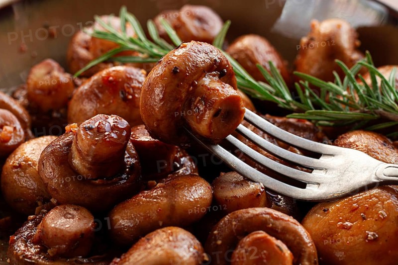Fried mushrooms, with spices, in soy sauce, vegetarian food, homemade, no people