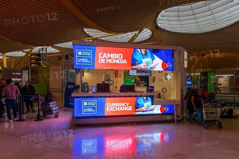 Cambio de Moneda currency exchange desk inside terminal 4 building, Adolfo SuÃ¡rez Madridâ€“Barajas airport, Madrid, Spain