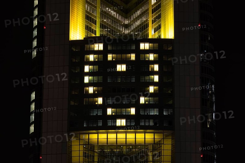 Lights inside the offices project a glowing yellow heart onto the faÃ§ade of the Commerbank Tower in Frankfurt am Main, Frankfurt am Main, Hesse, Germany