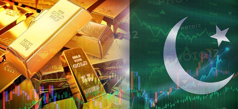 Gold bars stacked on Pakistani flag. Pakistan gold reserves, Concept