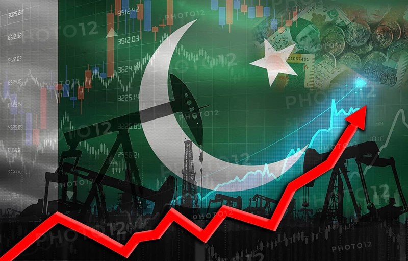 Oil production with Pakistan flag, petrol industry. Oil pumps with Pakistani flag