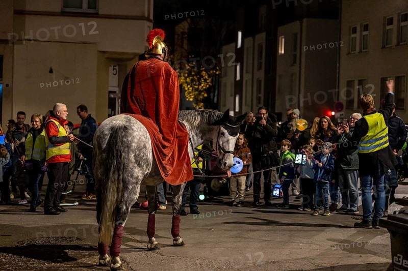 Martinszug in Essen-RÃ¼ttenscheid, the parish of St. Lambertus, Saint Martin actor on a horse, with over 500 participants, North Rhine-Westphalia, Germany