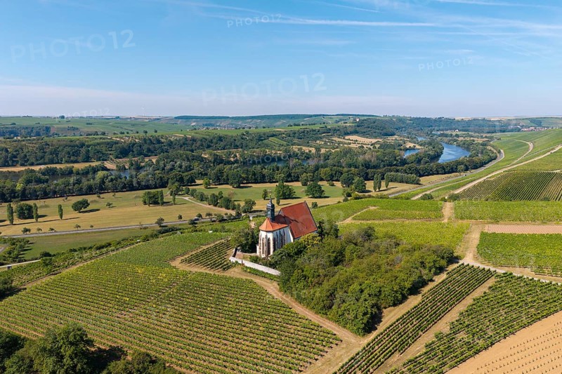 Pilgrimage church Maria im Weingarten, between vineyards, with river and green landscape in the background, aerial view, near Volkach am Main, Lower Franconia, Mainfranken, Bavaria, Germany