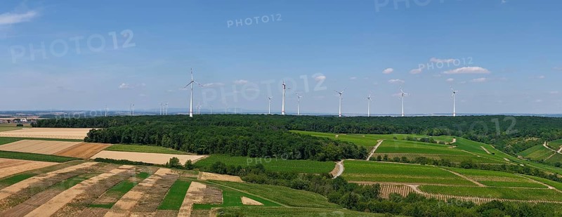 Panoramic view of fields with a wind farm in the background under a blue sky, aerial view, near Volkach, Mainfranken, Mainschleife, Franconia, Lower Franconia, Bavaria, Germany