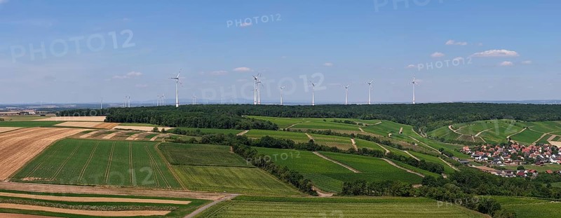 Panoramic view of fields with a wind farm in the background under a blue sky, aerial view, Eisenheim near Volkach, Mainfranken, Mainschleife, Franconia, Lower Franconia, Bavaria, Germany