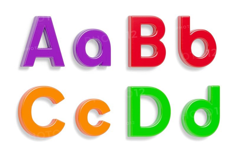 Colorful angled uppercase and lowercase magnetic plastic letters A through D with drop shadows isolated on a white background